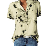 Camisa de mujer con estampado. Blusa de manga corta con cuello en V.