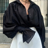 Blusa Suelta Elegante con Puños