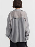 Camisa holgada fina
