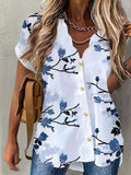 Camisa estampada con cuello en V de mujer. Blusa floral de mujer con botón de manga corta.