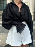 Blusa Suelta Elegante con Puños