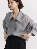 Camisa holgada fina